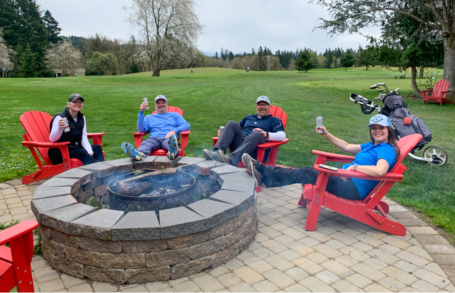 Golfers gathered at the Kohl Creek firepit after a tournament